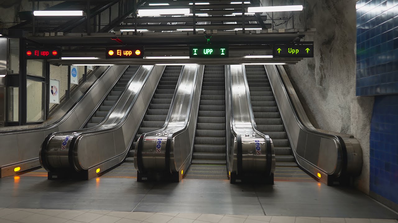 Sweden, Stockholm, Universitetet subway station 2X escalator