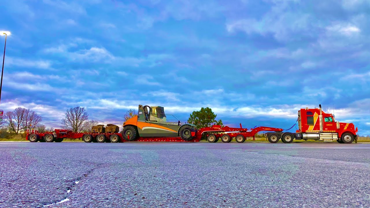 Liebherr Container Handler on 11 axle beam trailer 🤙