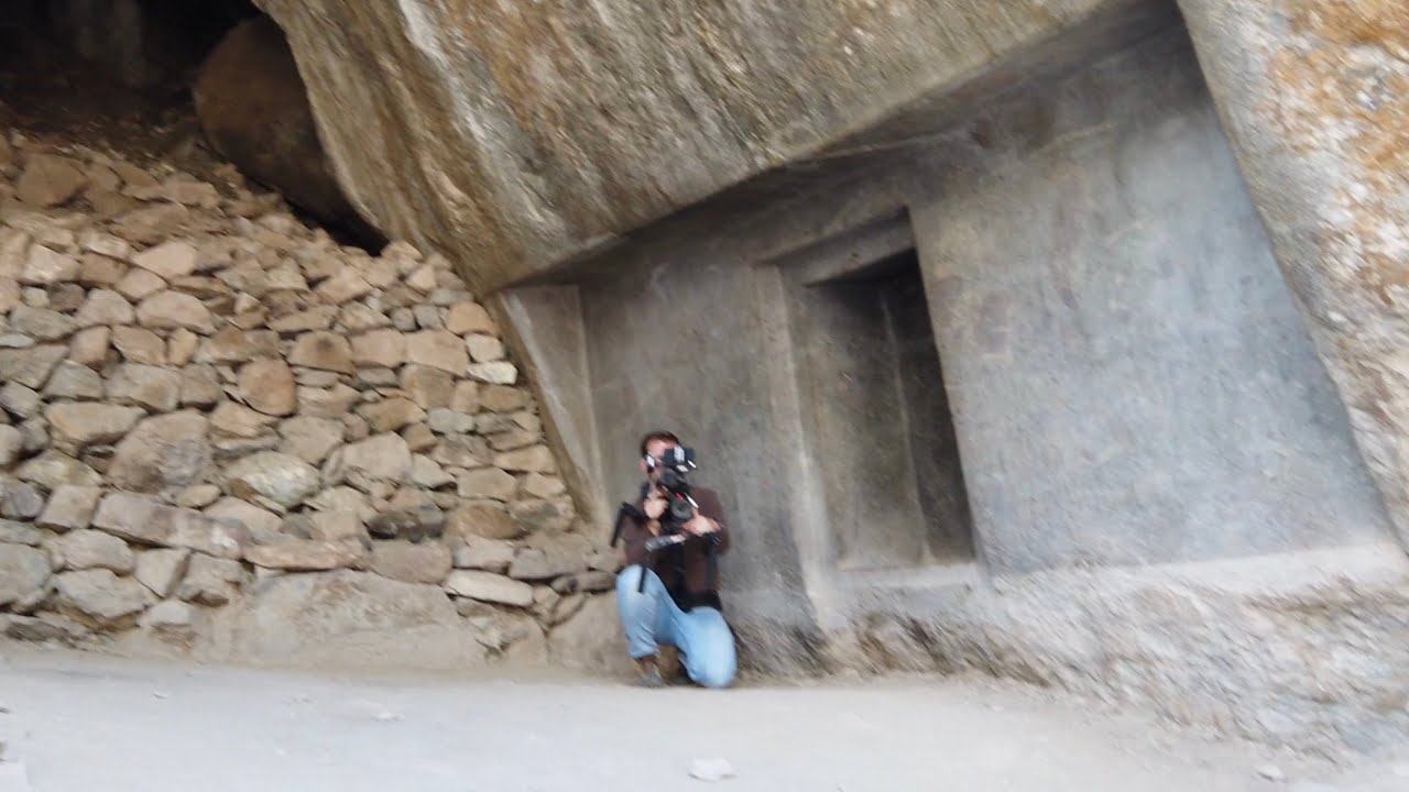 Documentary Crew At A Megalithic Cave In The Sacred Valley Of Peru