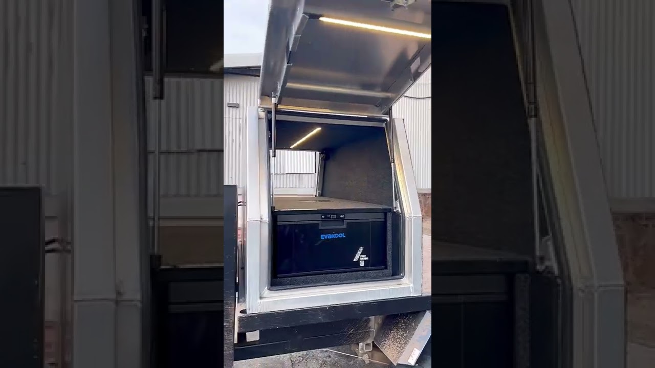800mm canopy fitout. 40L Evacool drawer fridge, large tool drawer, reused existing 12v system