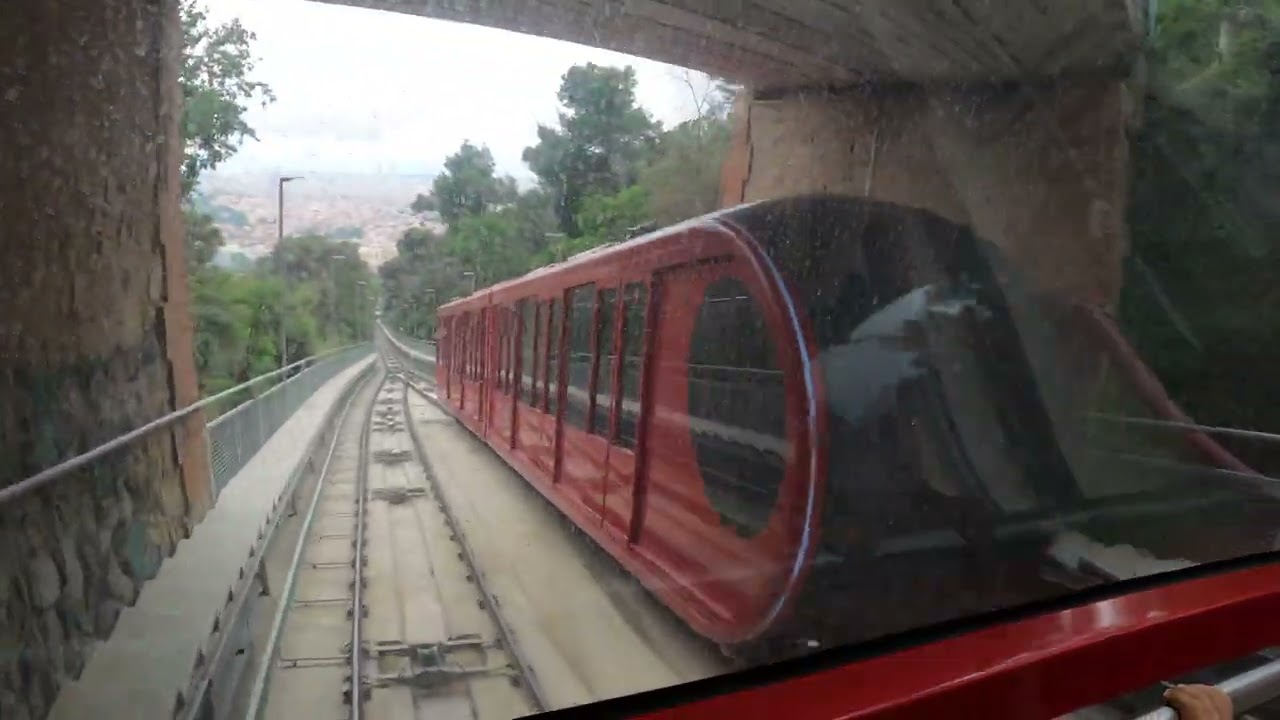 Cuca de Llum Tibidabo Funicular Going down the Mountain Going up via this Train 🚆 is very nice too☀️