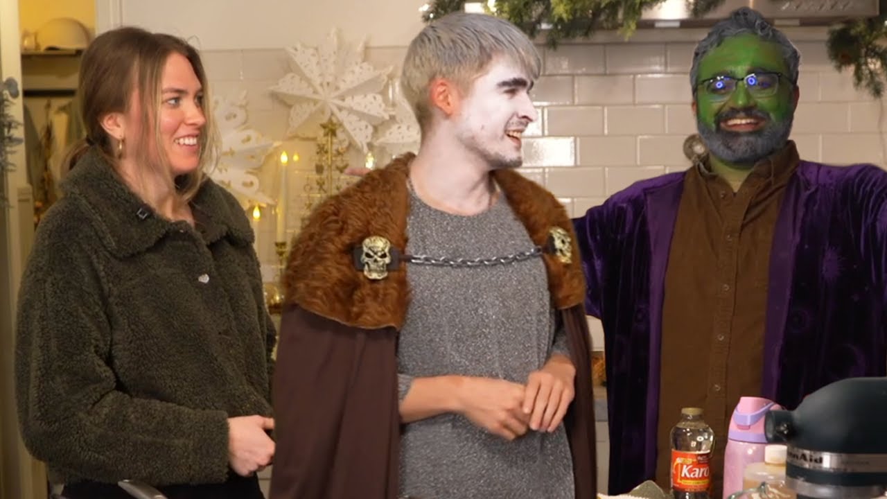Squeex and Ludwig show off their costumes to QT...