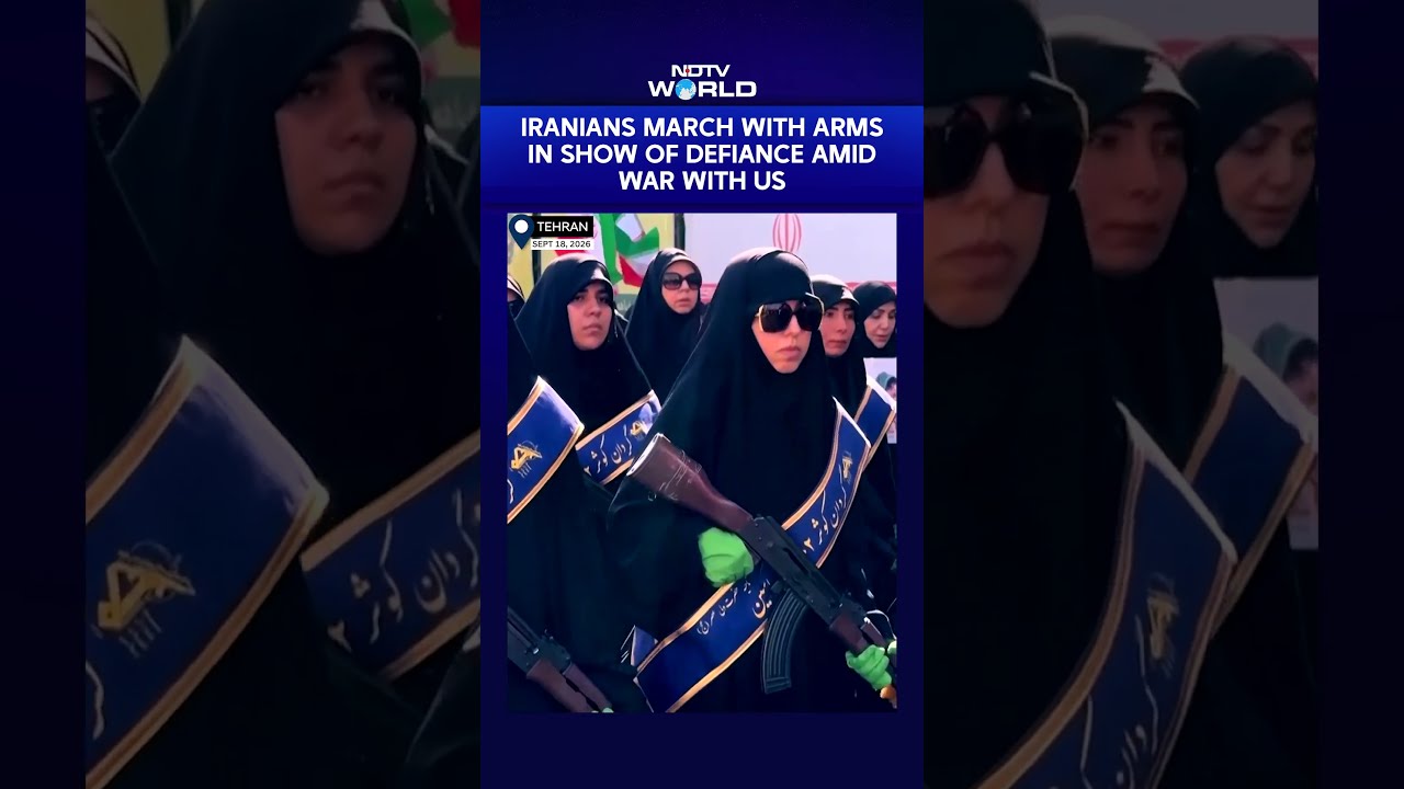 US Iran War News | Hundreds Of Iranians March While Carrying Arms In Show Of Defiance Amidst War