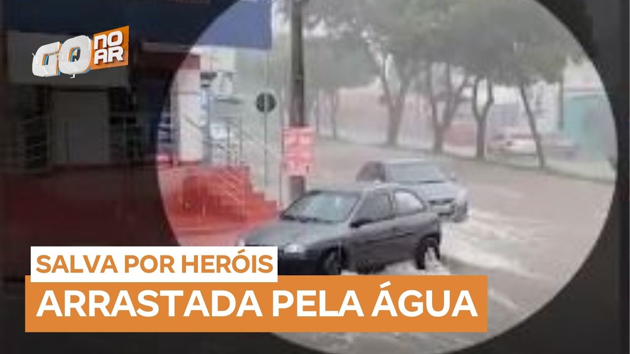 Mulher é arrastada por enxurrada e resgatada por populares