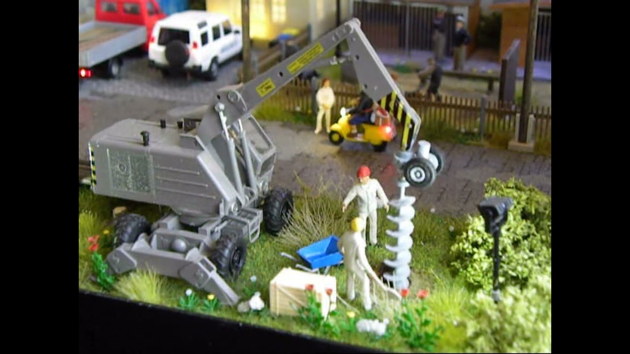 Bewegliche und beleuchtete Figuren HO - Das Schnäppchenhaus