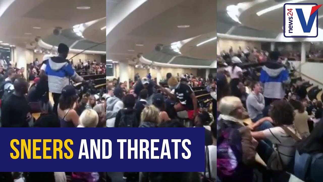 WATCH: Stick-wielding protester whips at UCT student
