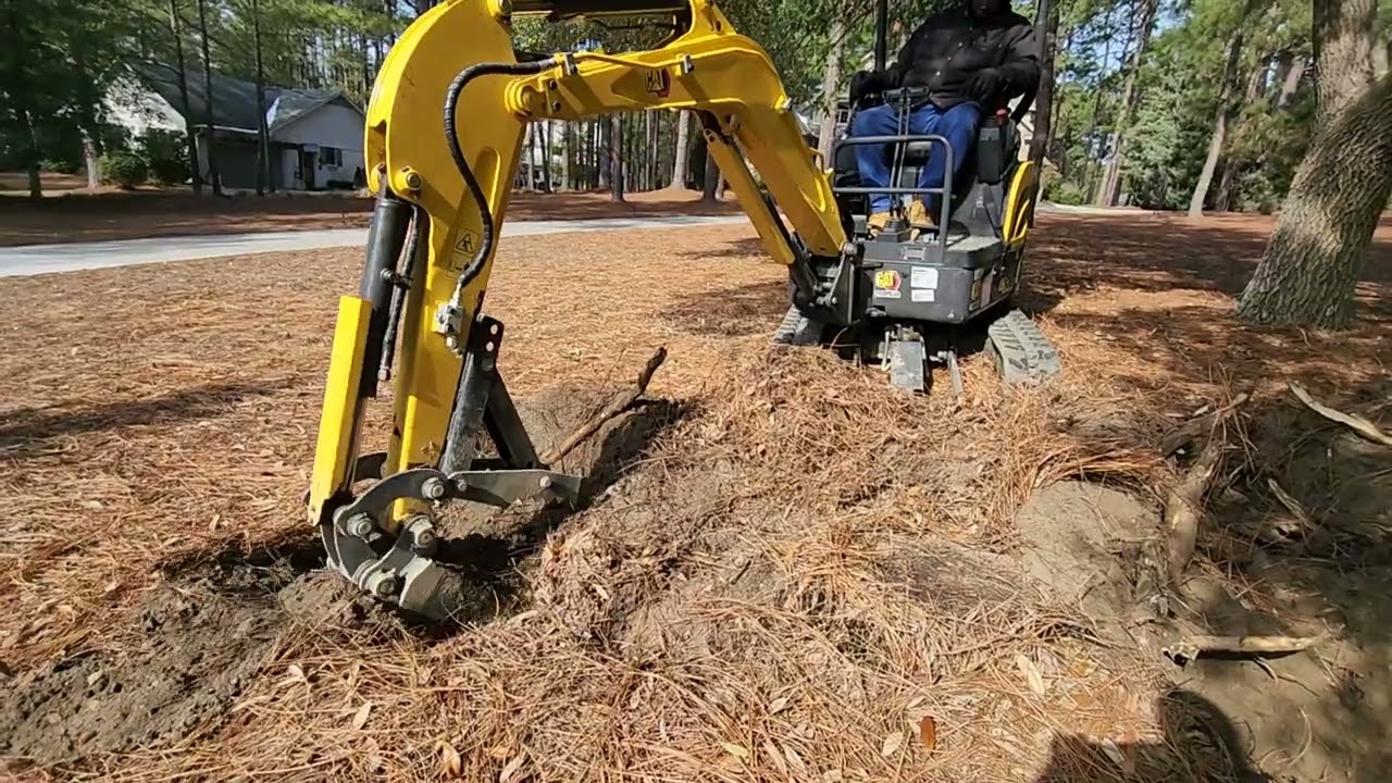 New Holland E17c stump removal 