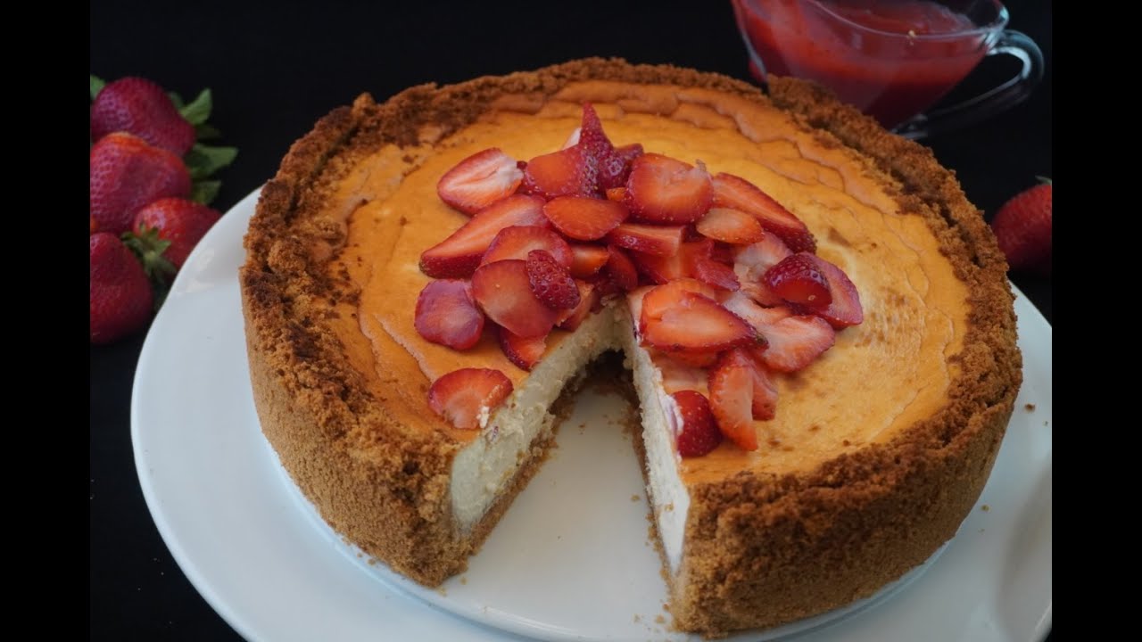 Honey Ricotta Cheesecake Served With Strawberries Sauce