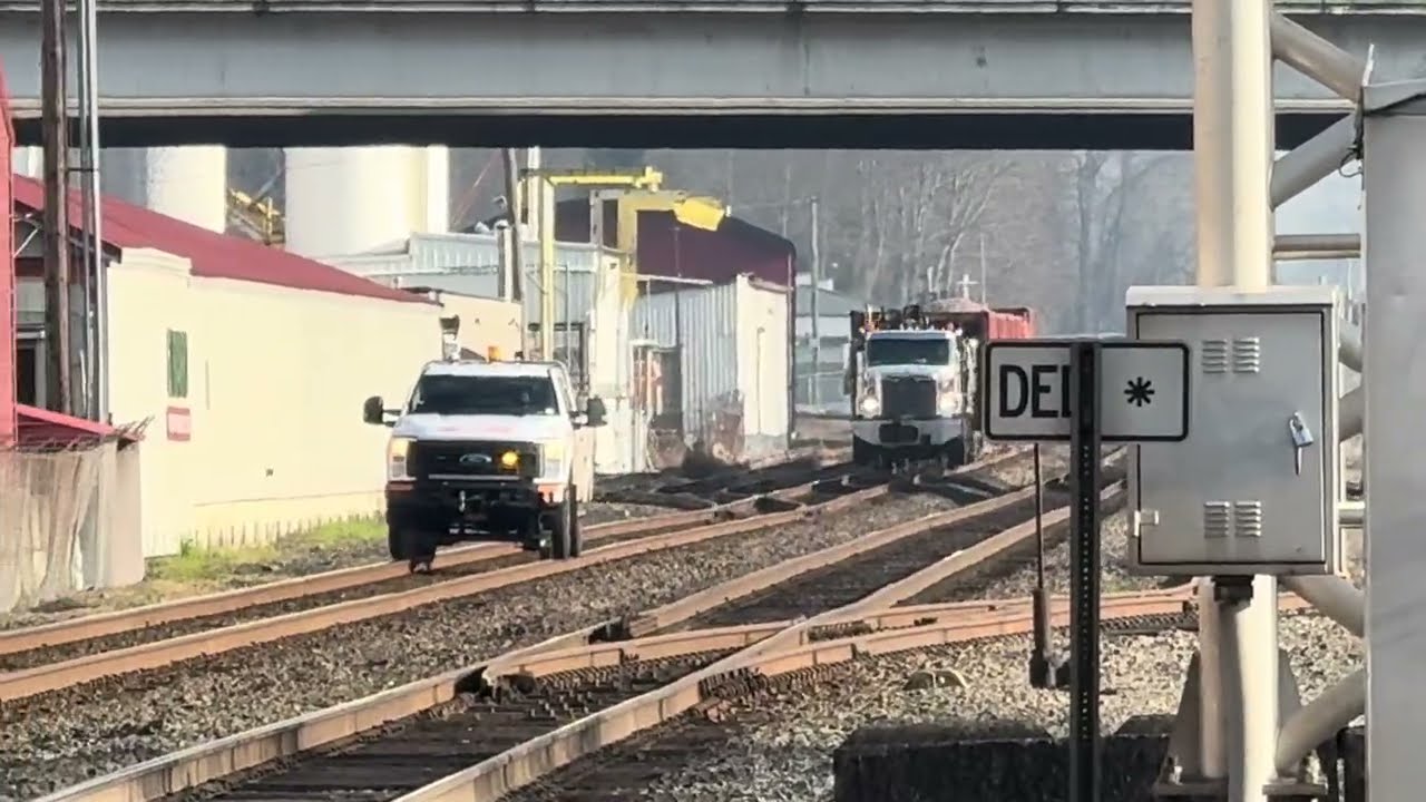 Maintenance Of Way passing through the 5TH Street Southeast Railroad Crossing.