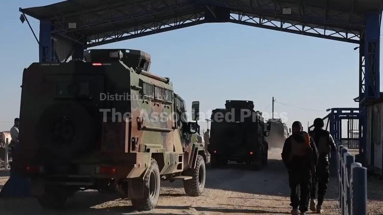 Military arrives after Kurdish-led forces abandon a camp housing IS group families in Syria