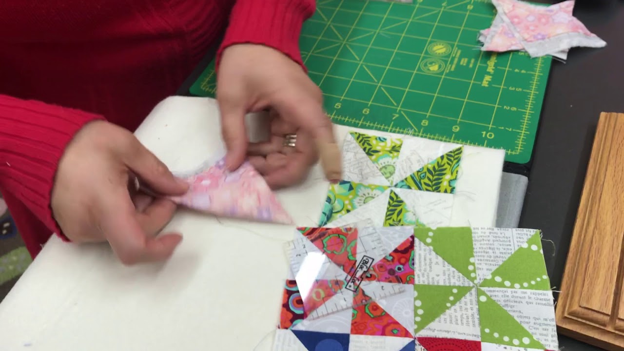 How to sew half square triangles. Bloc Loc ruler cutting system how to get perfection every time.