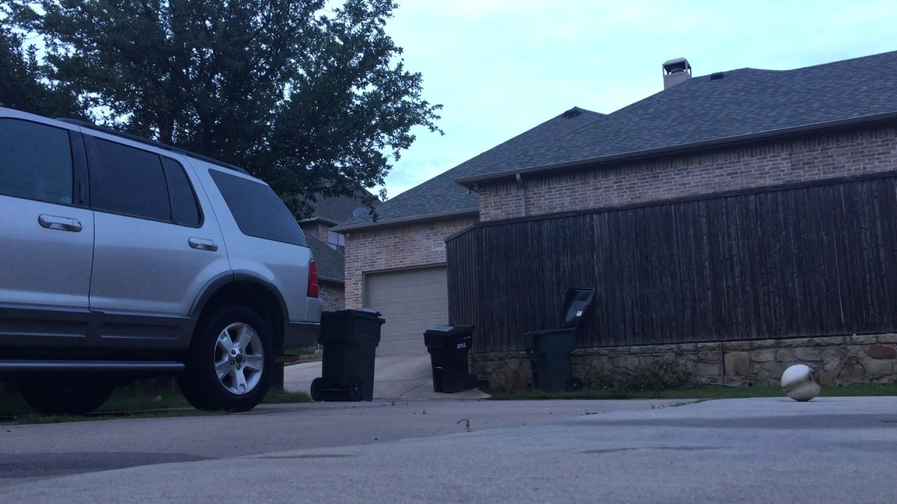 THIN KID KICKS SOCCER BALL IN THE TRASH CAN