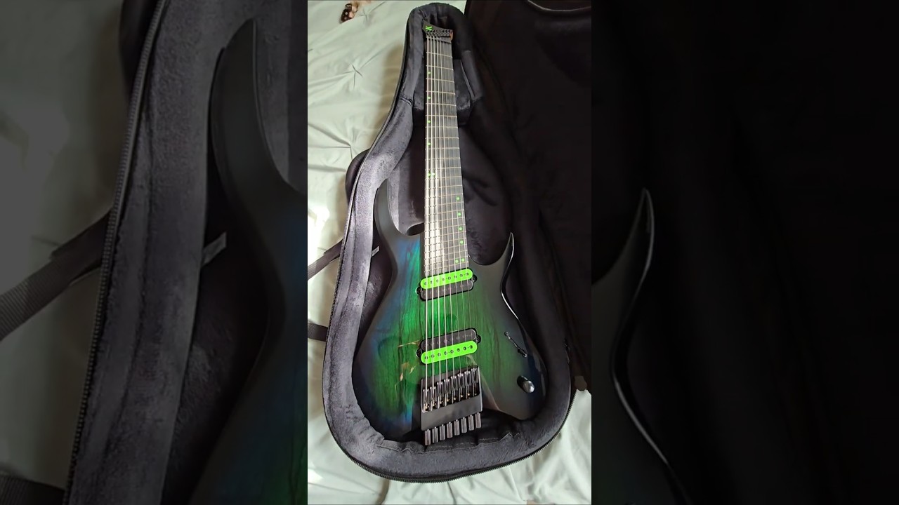 The New Kiesel Kyber Headless 8 String! Dragonburst Finish with Blacked out edges.