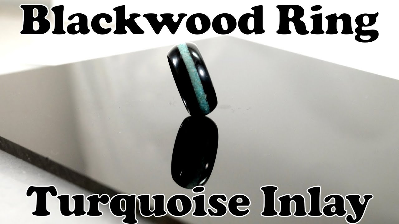 Blackwood ring with a crushed turquoise inlay