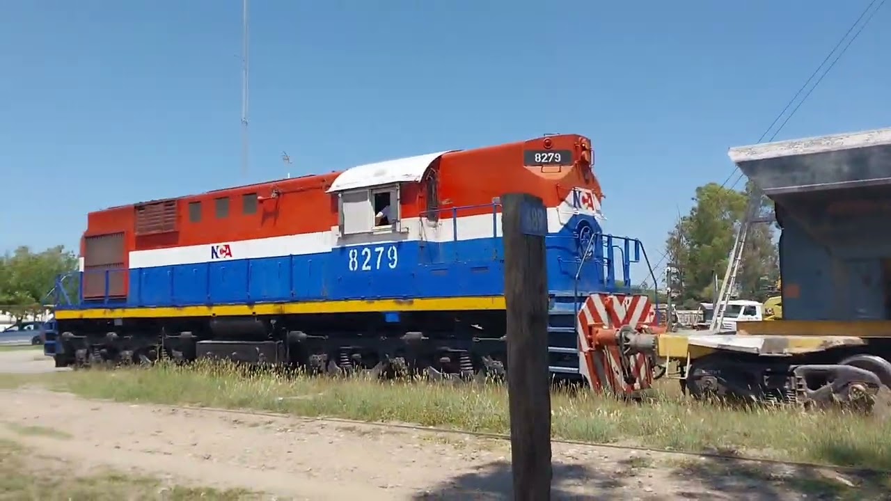 ALCo RSD-16 8279 llegando a ferreyra y UN VAGON CHIRRIANTE 