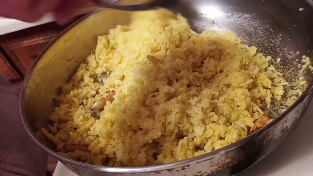 COOKING  FRIED RICE.