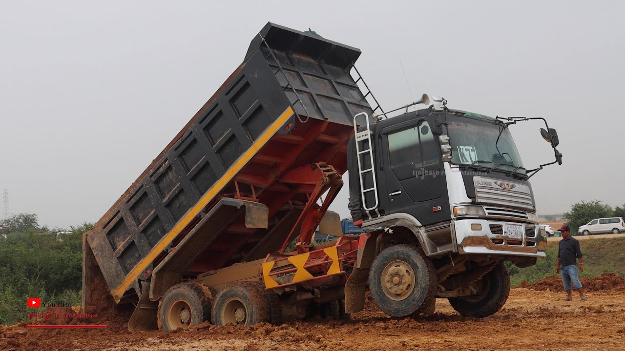 Bulldozer Power Pushing Soils With Dump Truck Working Unloading Extreme Full