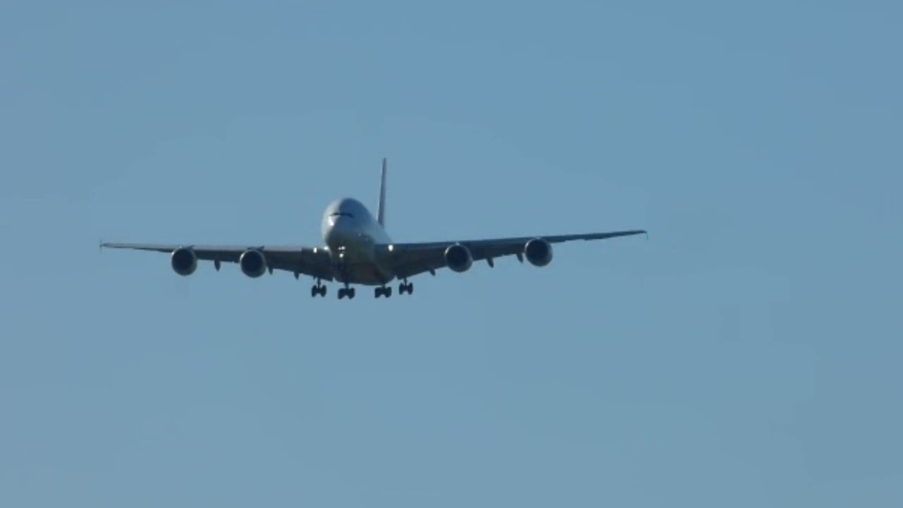 ek412 arriving from the north on a warm sunny cool winters day