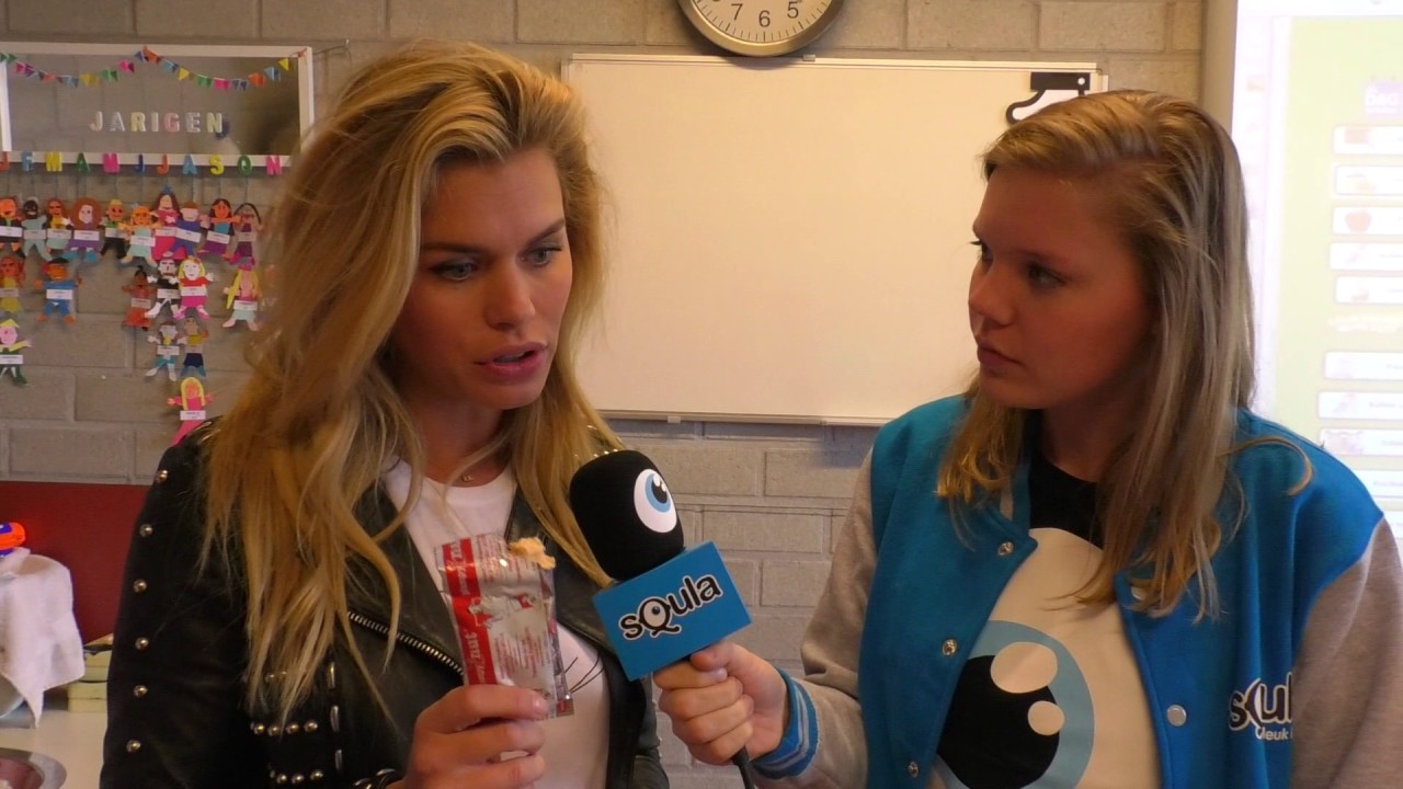 Nicolette van Dam ontvangt namens UNICEF cheque Leuk Leren Week