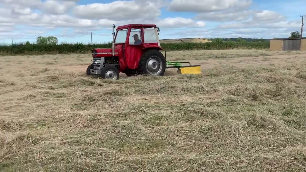 Massey Ferguson 135 turning hay