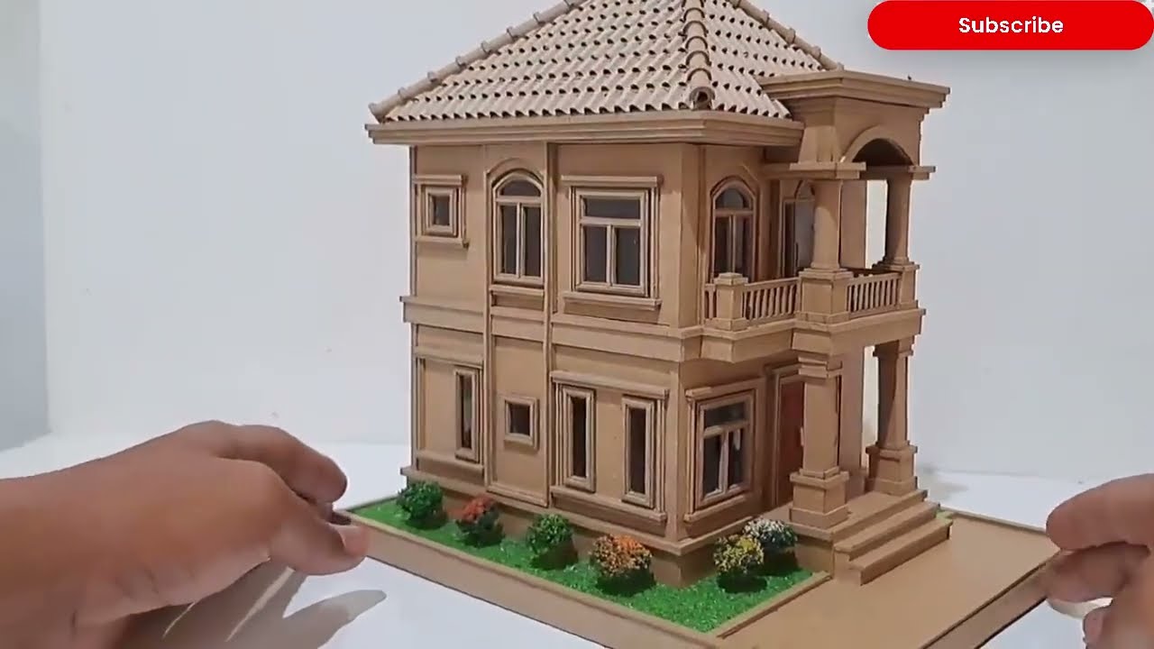 Learn how to make a two-story house out of cardboard