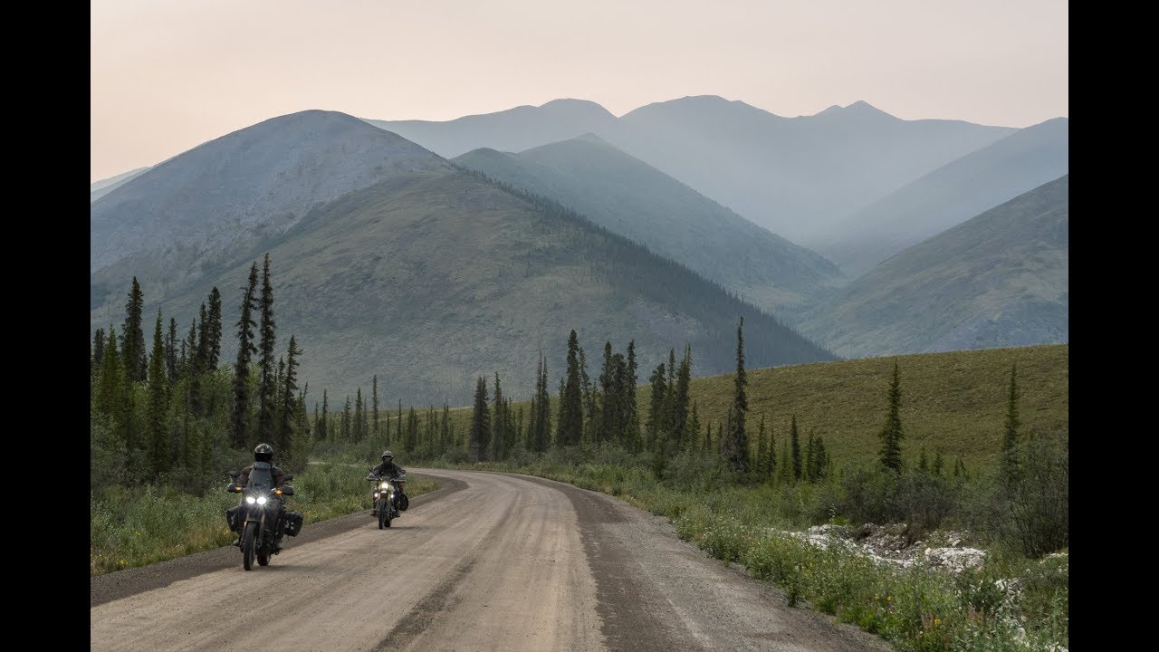 Traveling to Tuktoyaktuk on the Arctic Ocean by adventure motorcycle