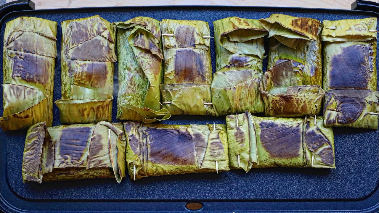 TARO COCONUT STICKY RICE WRAPPED IN BANANA LEAVES