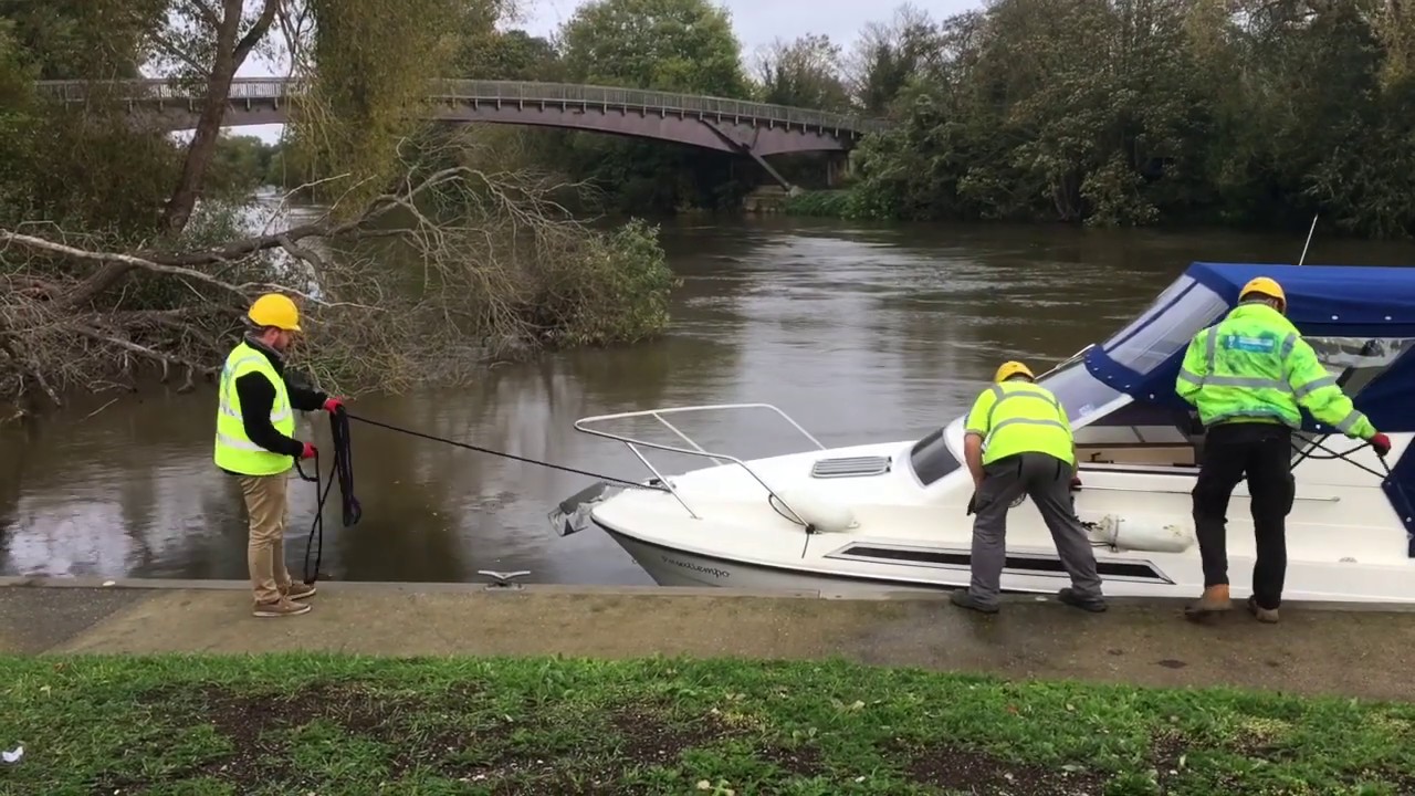 Fairline Sprint being lifted for a winter on the hard.