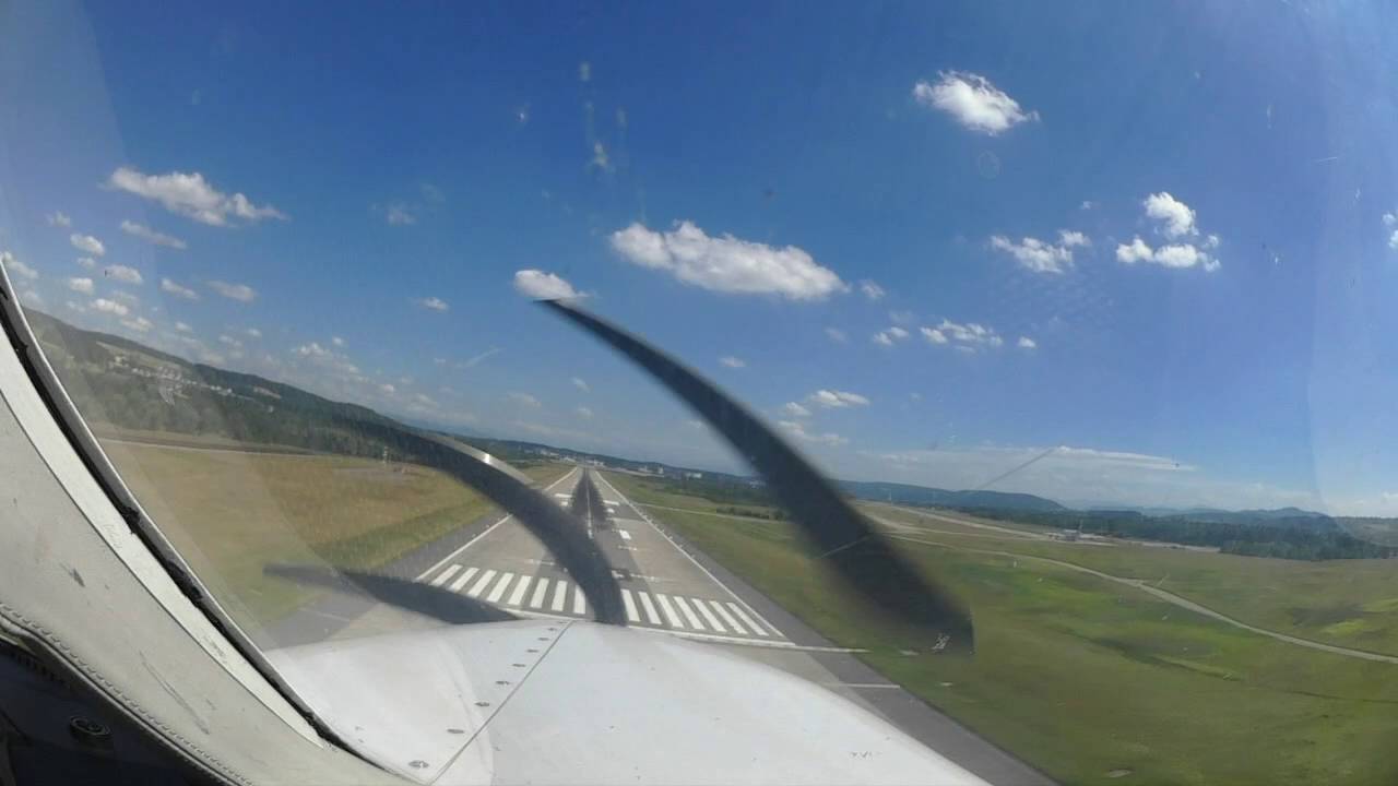 Pilot's Eye, Landing Left Base on Runway 14  in  Zürich LSZH, Switzerland  with a Cessna P210 Silve