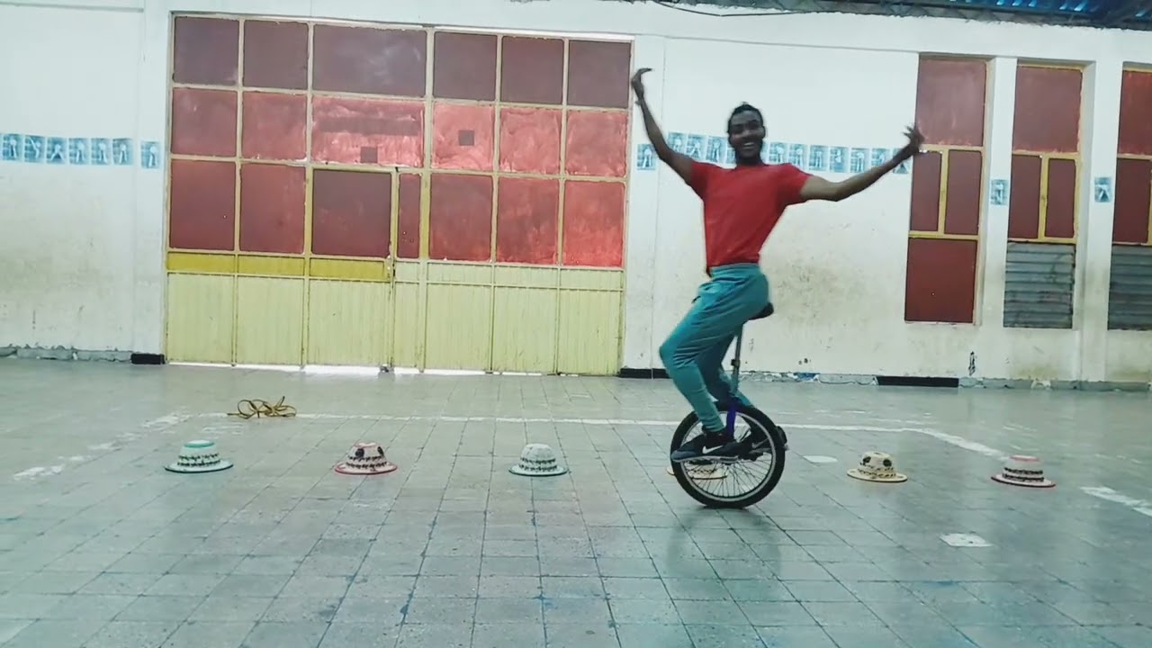 miki clown unicycle act