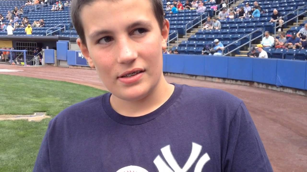 Cancer survivor Ian Torello, 12, throws out a first pitch In St. George