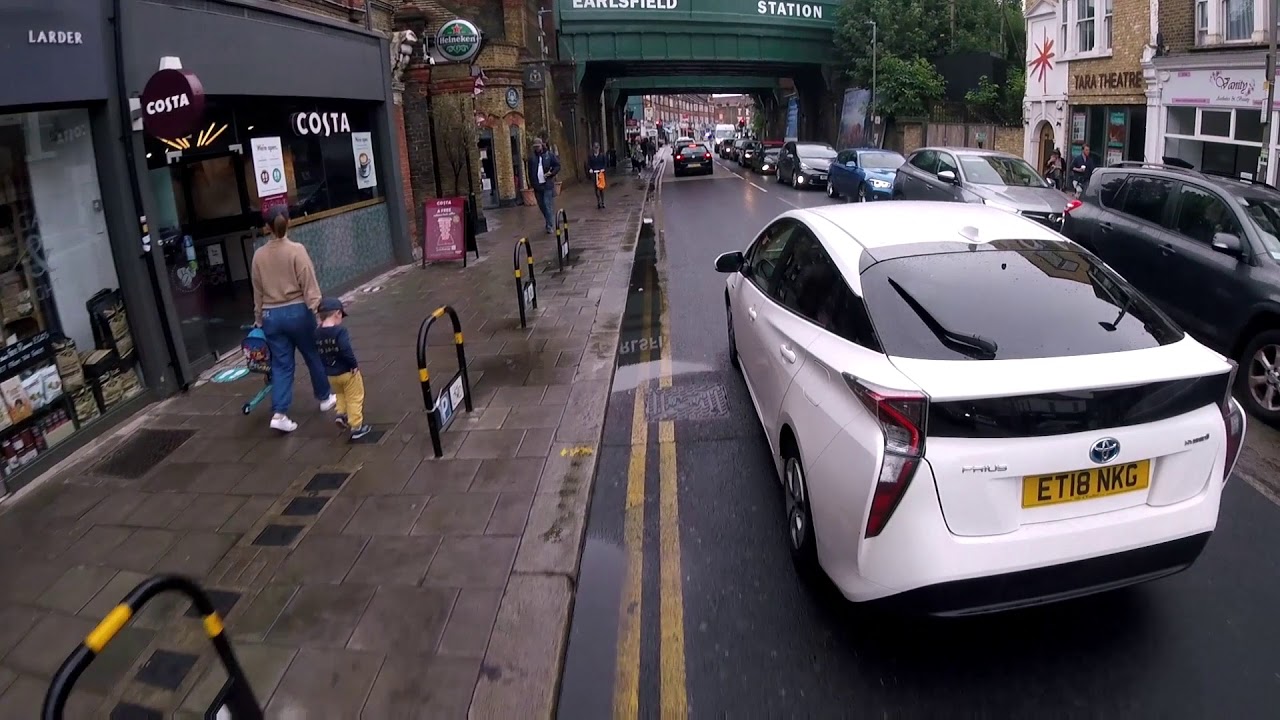 ET18 NKG Private hire vehicle - driver on the phone- Police formal warning