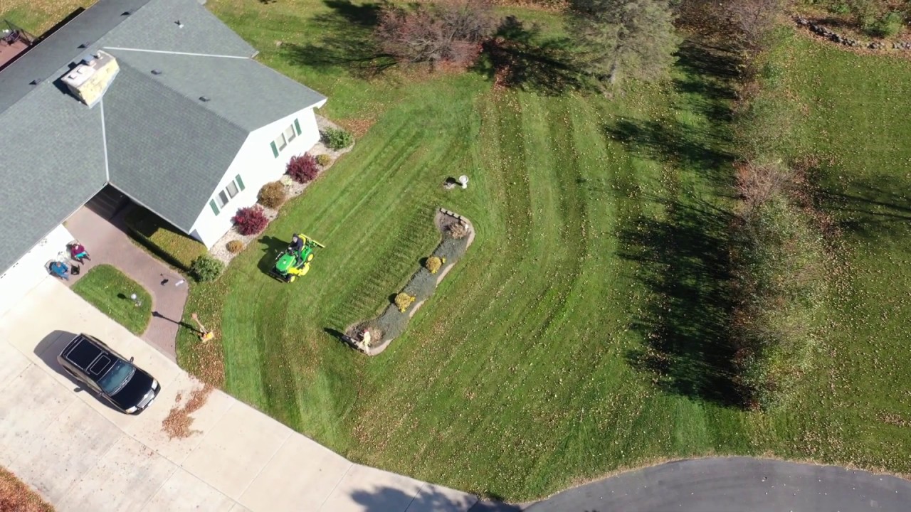 John Deere Fall Mowing. X700 series john deere. striping lawn.