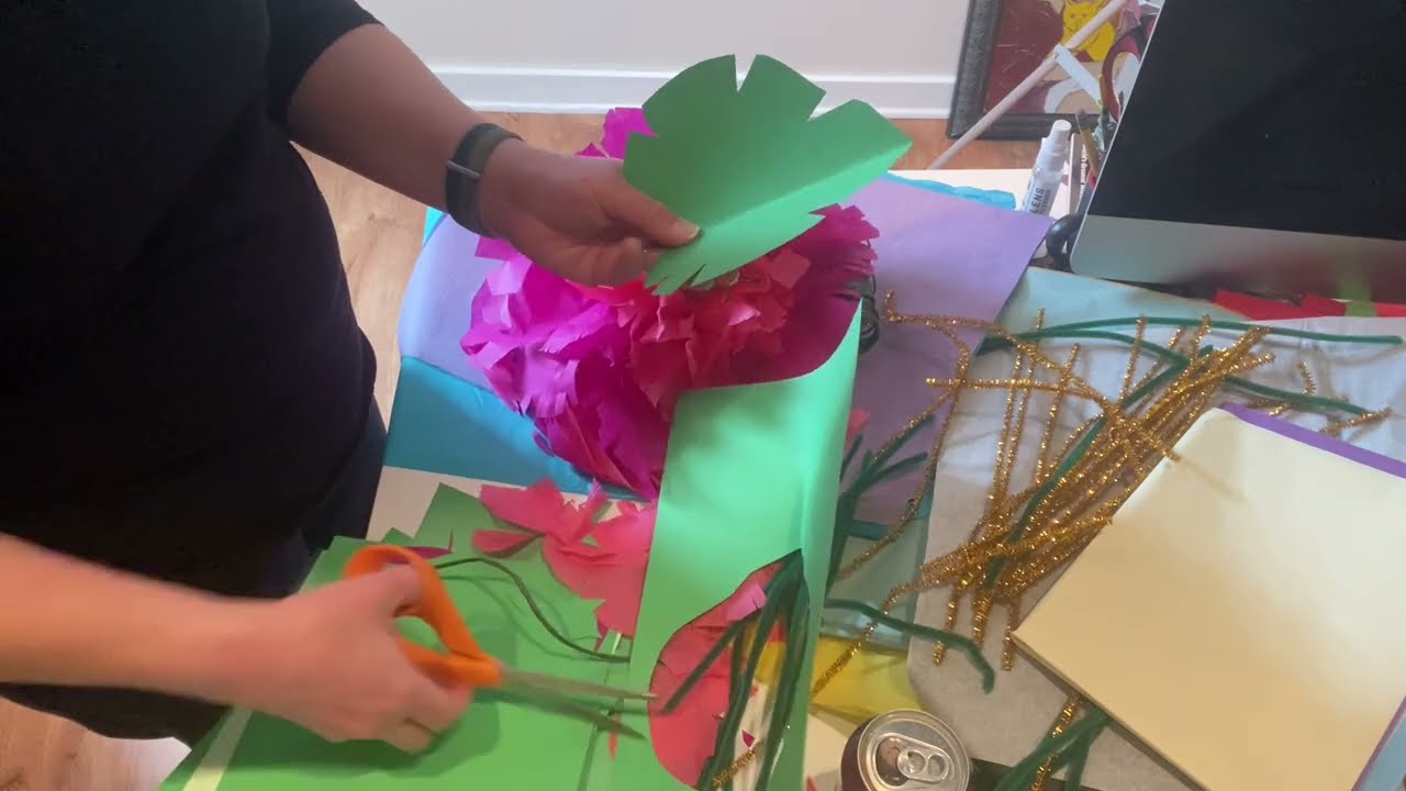 Making Paper flowers leaves and butterfly.  For my daughter’s 9yo Encanto birthday