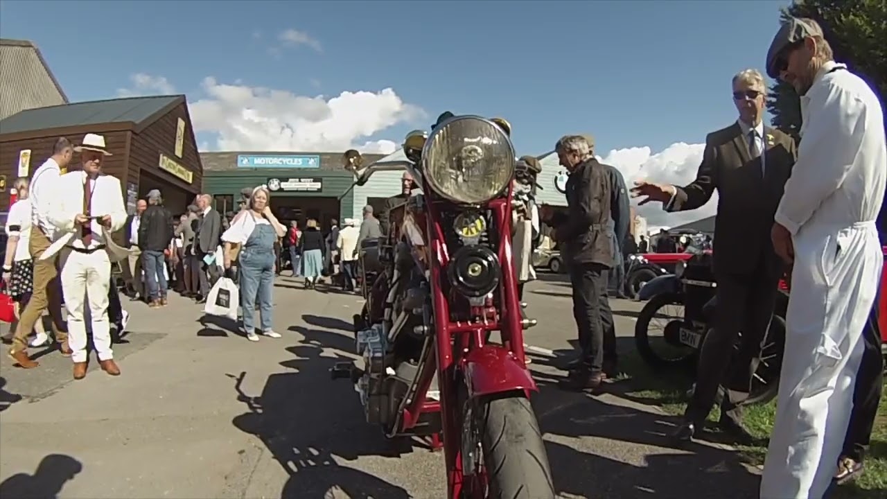 The Flying Millyard spitting fire  at Goodwood Revival 2022