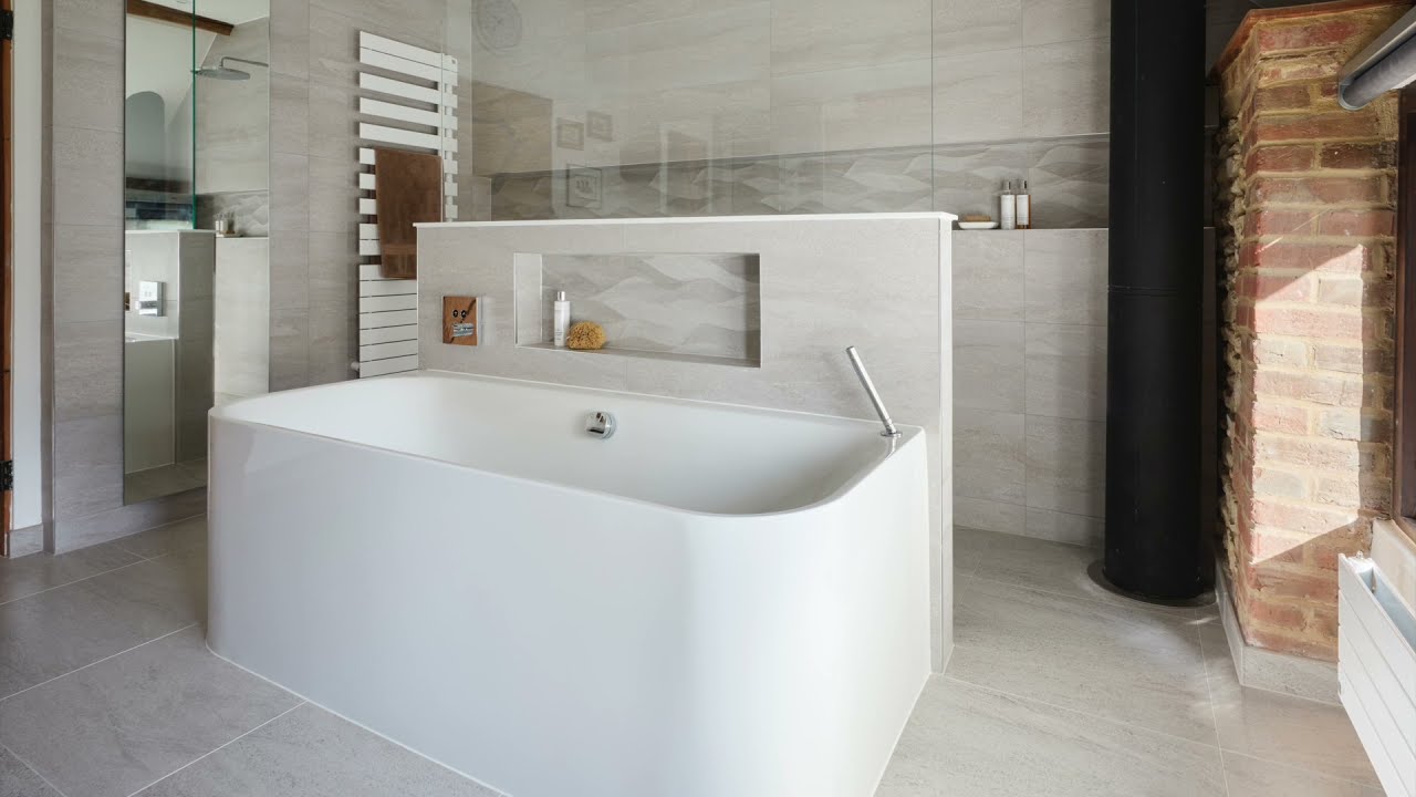 Clean and Cleansing - A luxury master ensuite bathroom featuring a large bathtub and walk-in shower