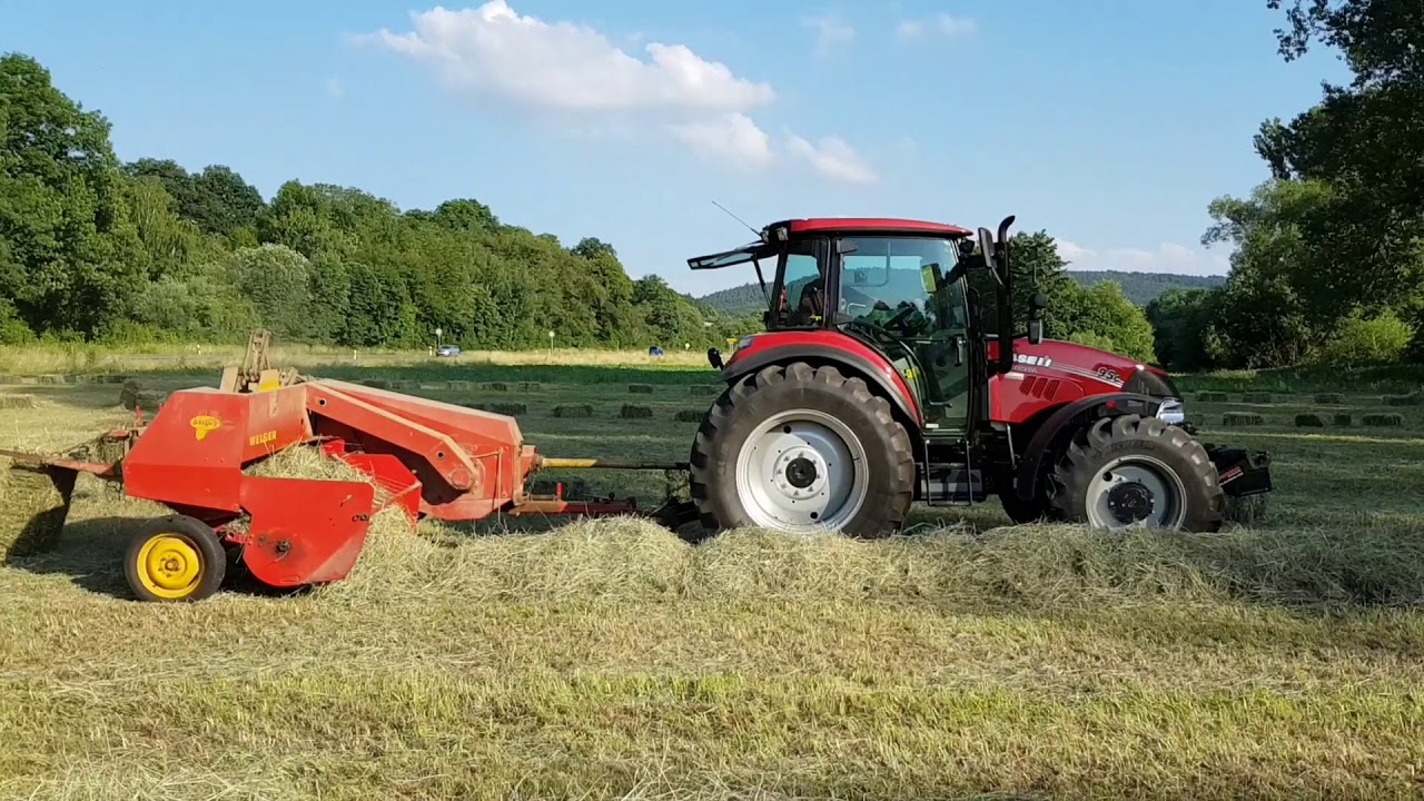 Heuernte 2018 HD Ballenpressen mit Case Farmall 95 C und Welger AP 41