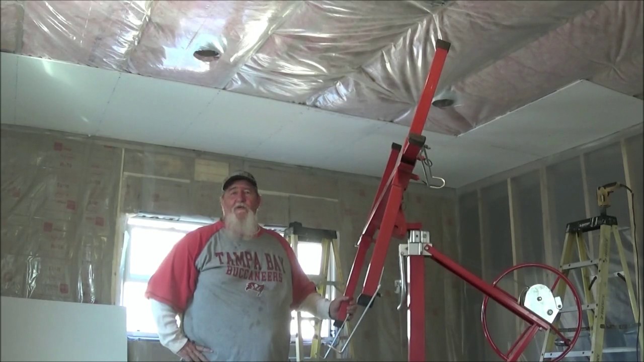 How we hung drywall on the ceilings and cut out the can lights. Prt 2