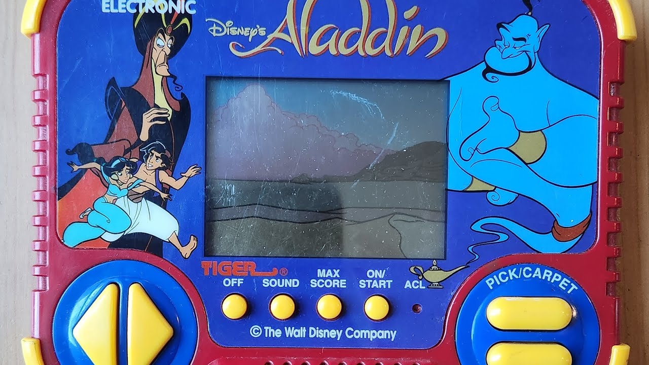 Vintage 1990 Aladdin handheld game - garage sale find