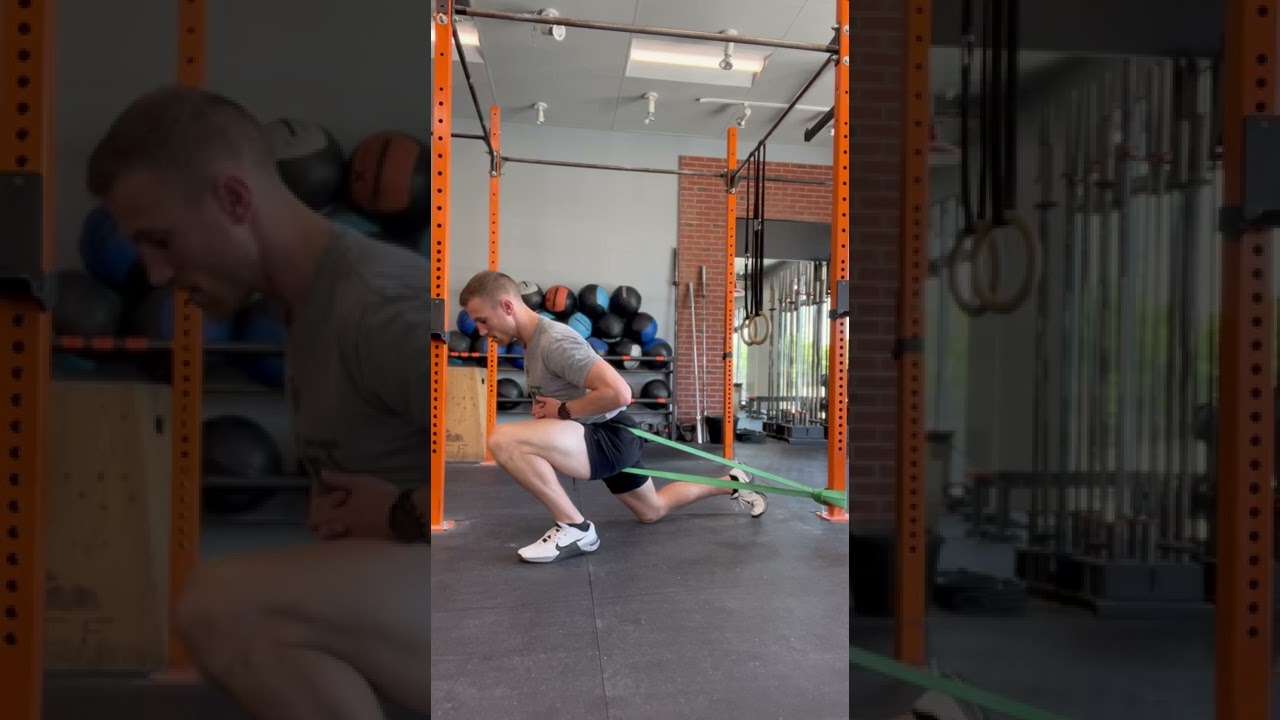 1/2 Kneeling Hip Mobilization with Band Distraction (posterior)