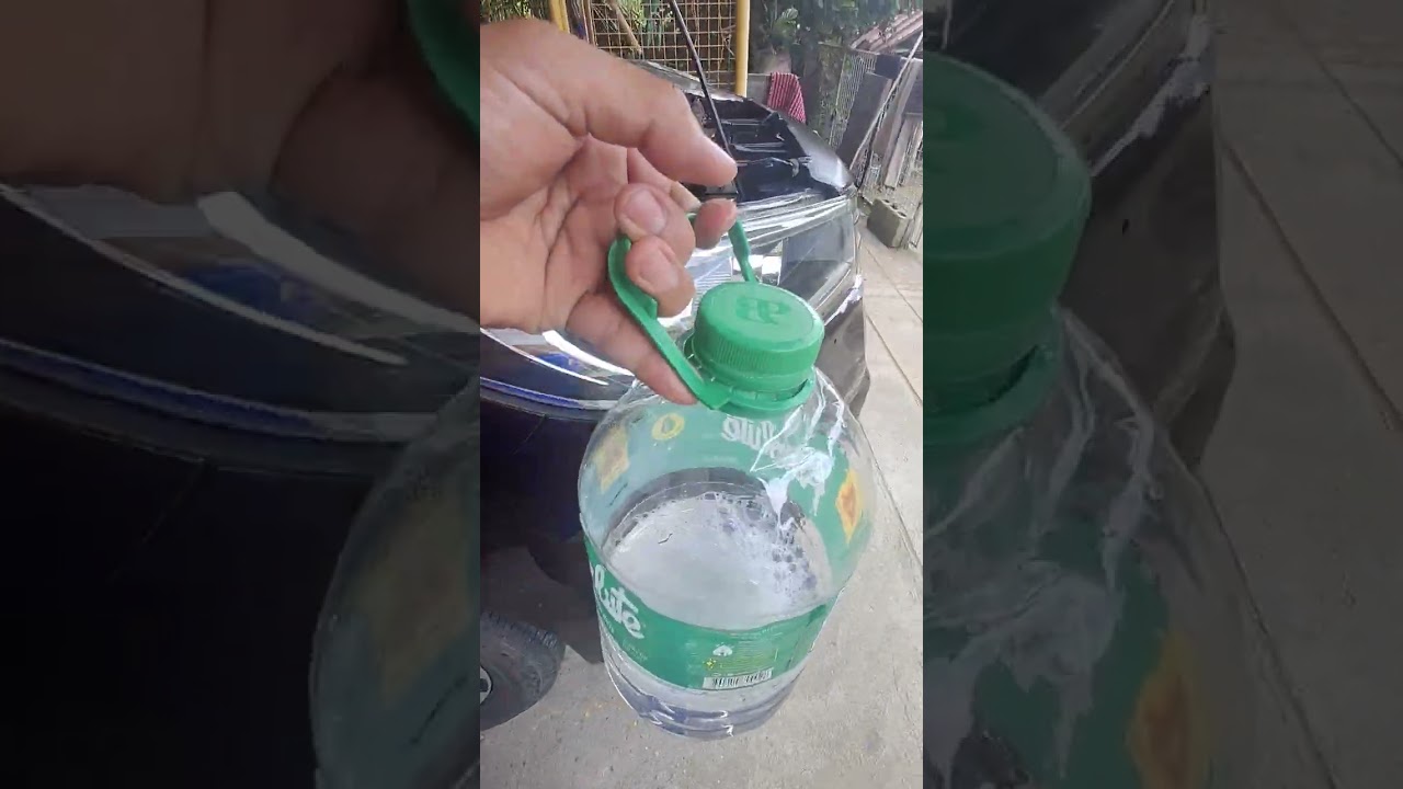 Innova windshield washer reservoir, using RAIN-X. #Rain-x #innova #windshieldwasher