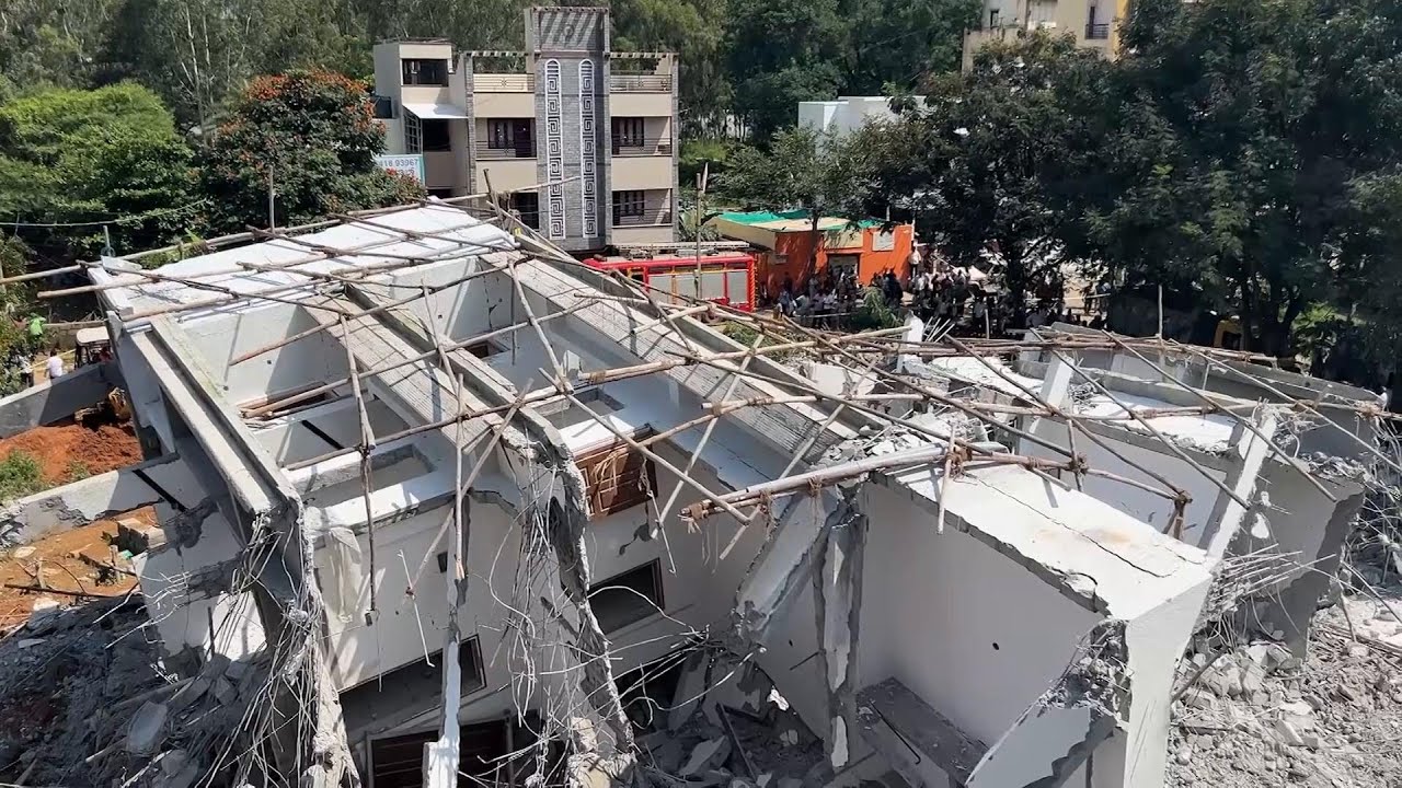 Building collapses during heavy rains in southern India city, killing at least 5 workers