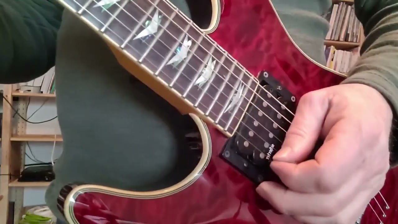 Cours de guitare :  travaille la main droite à la guitare avec un médiator