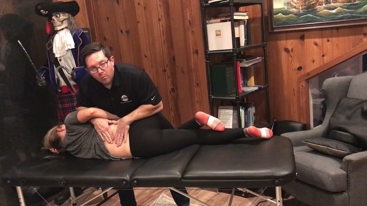 Side lying lumbar manipulation - Therapist's center of gravity adjustment