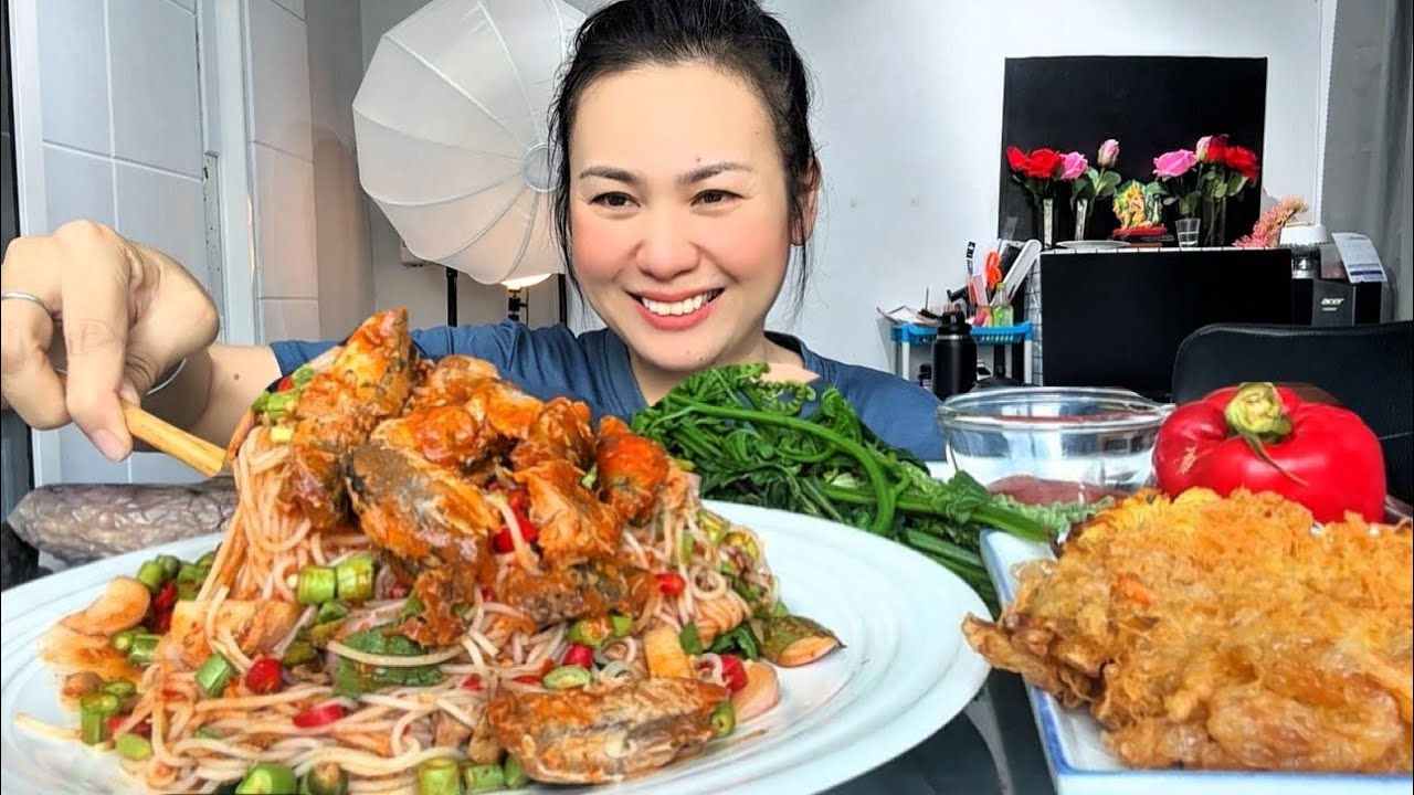Thai food ASMR: Spicy Khanom Jeen noodle salad with canned fish and fried egg-battered bamboo sho...