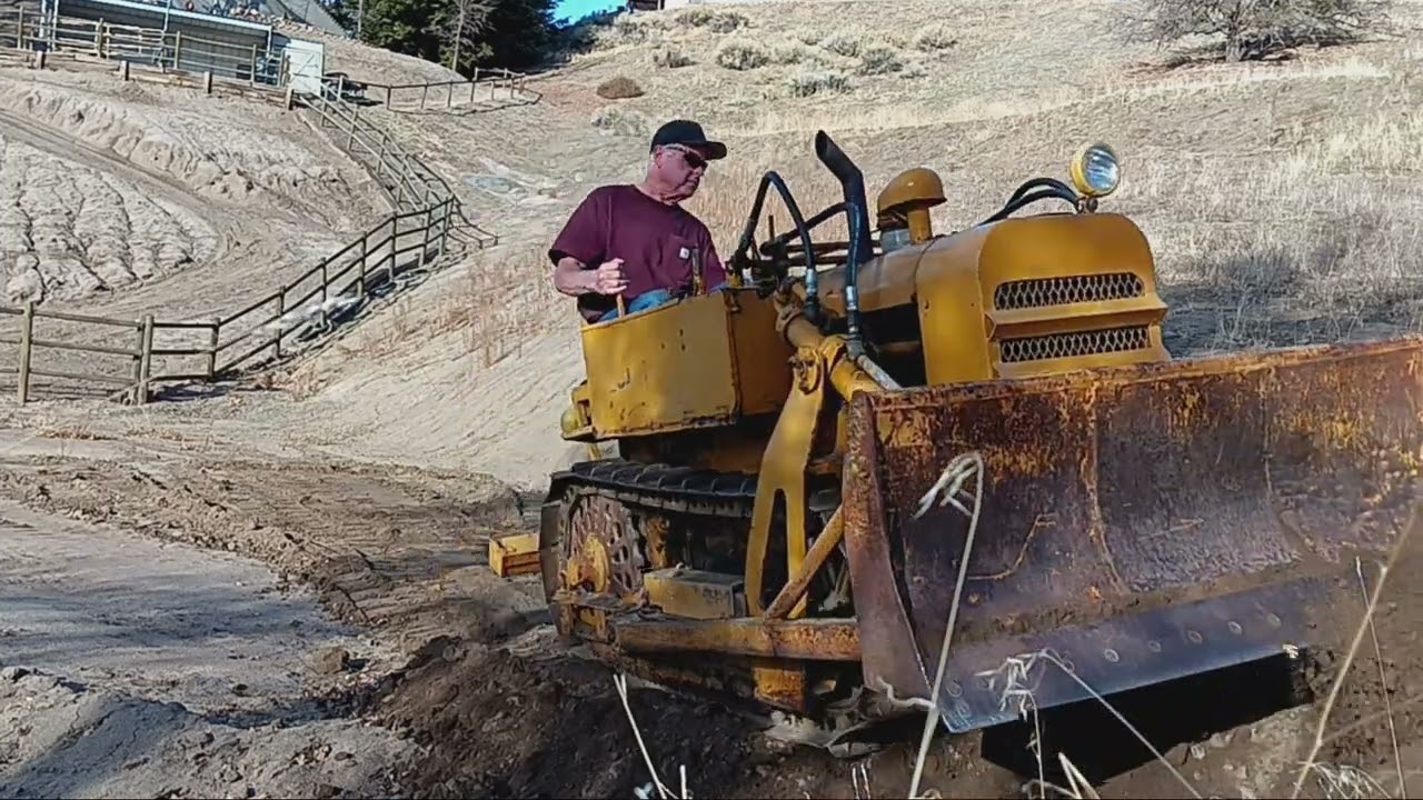 CLARK CA1 WW 2 AIRBORNE DOZER GETTING A WORKOUT