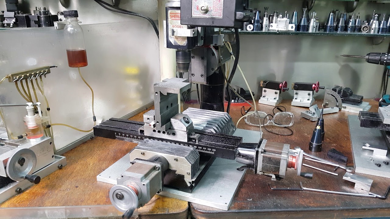 Drilling and 4 mm Thread Milling on Nodular Cast Iron using a 2010 Sherline Mill.