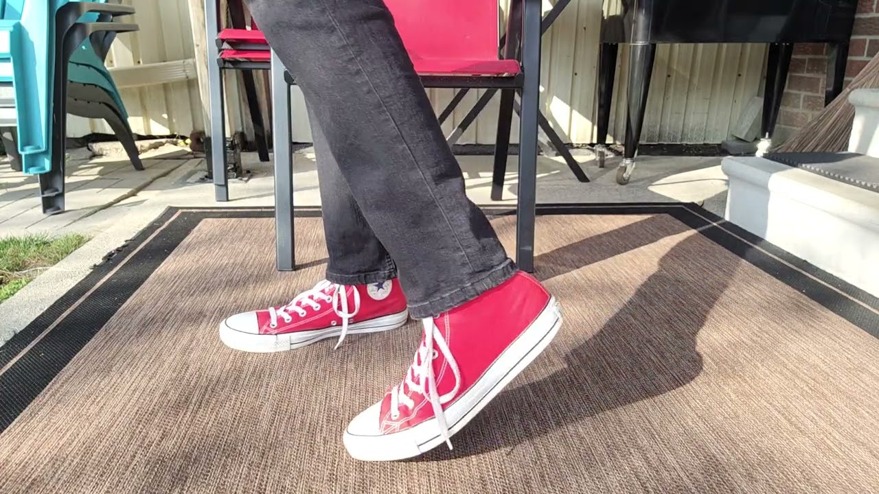 Red converse high tops with black jeans 