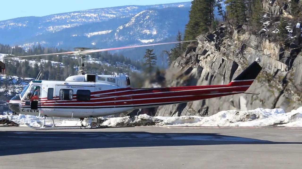 Bell 205 taking off from cznl