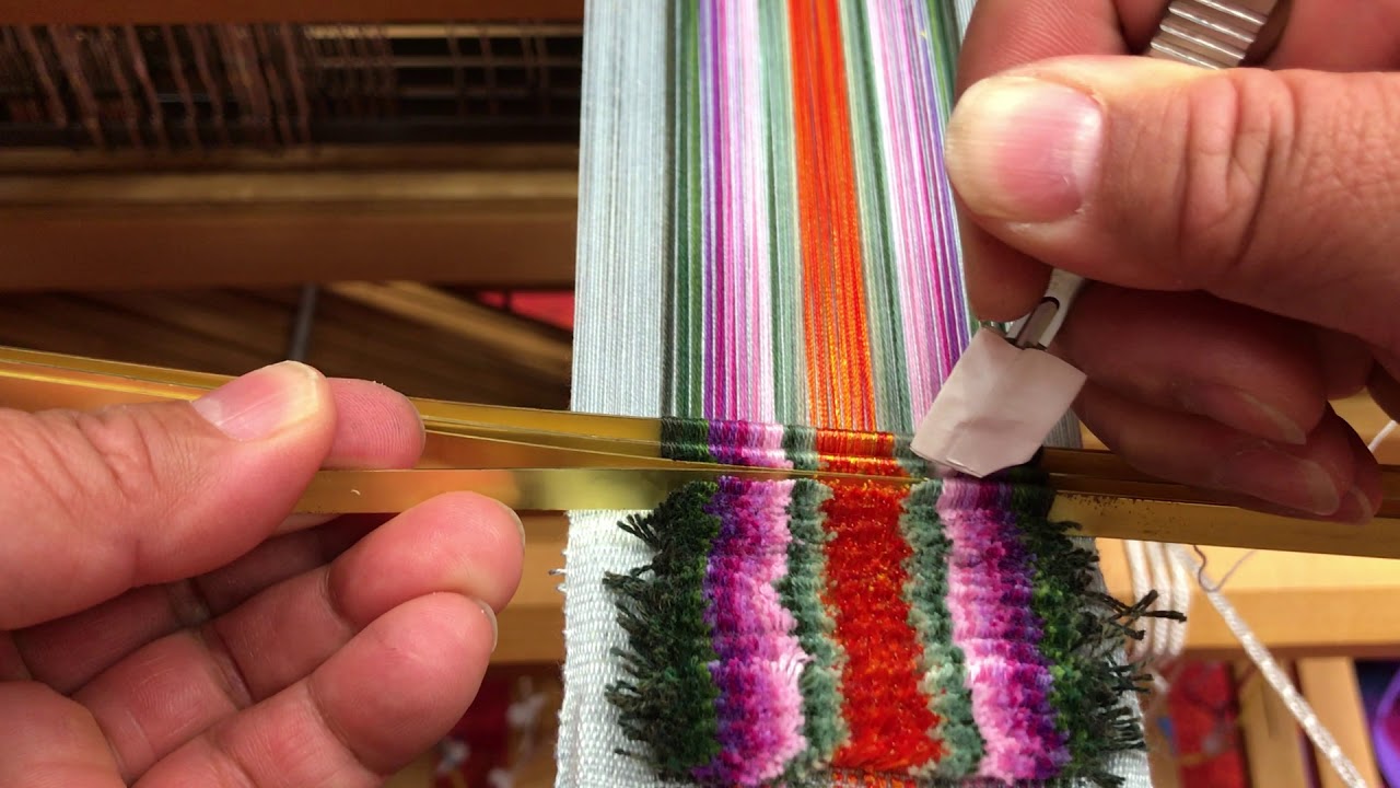 Cutting the pile on handwoven velvet